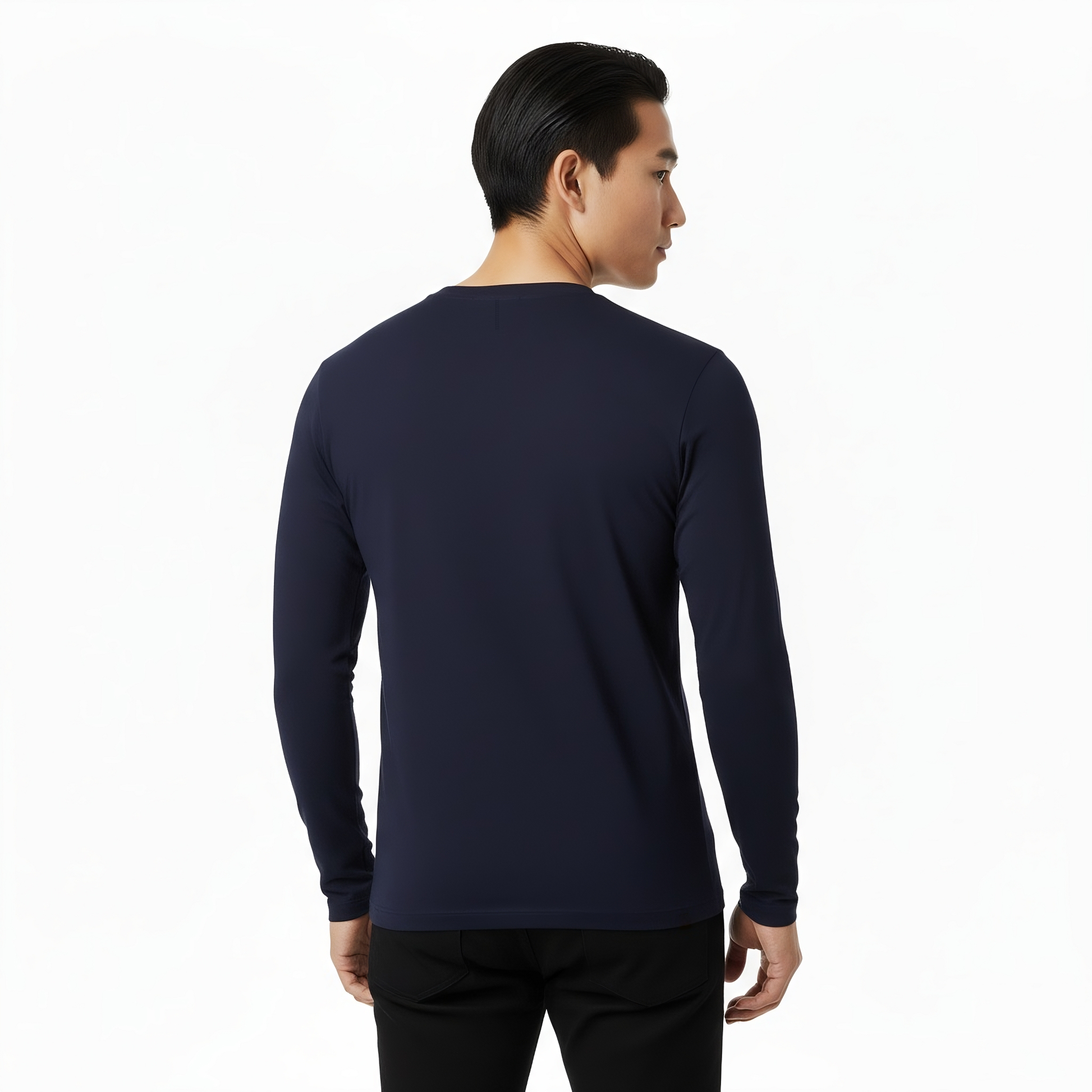 Person wearing a navy long-sleeve shirt on a white background