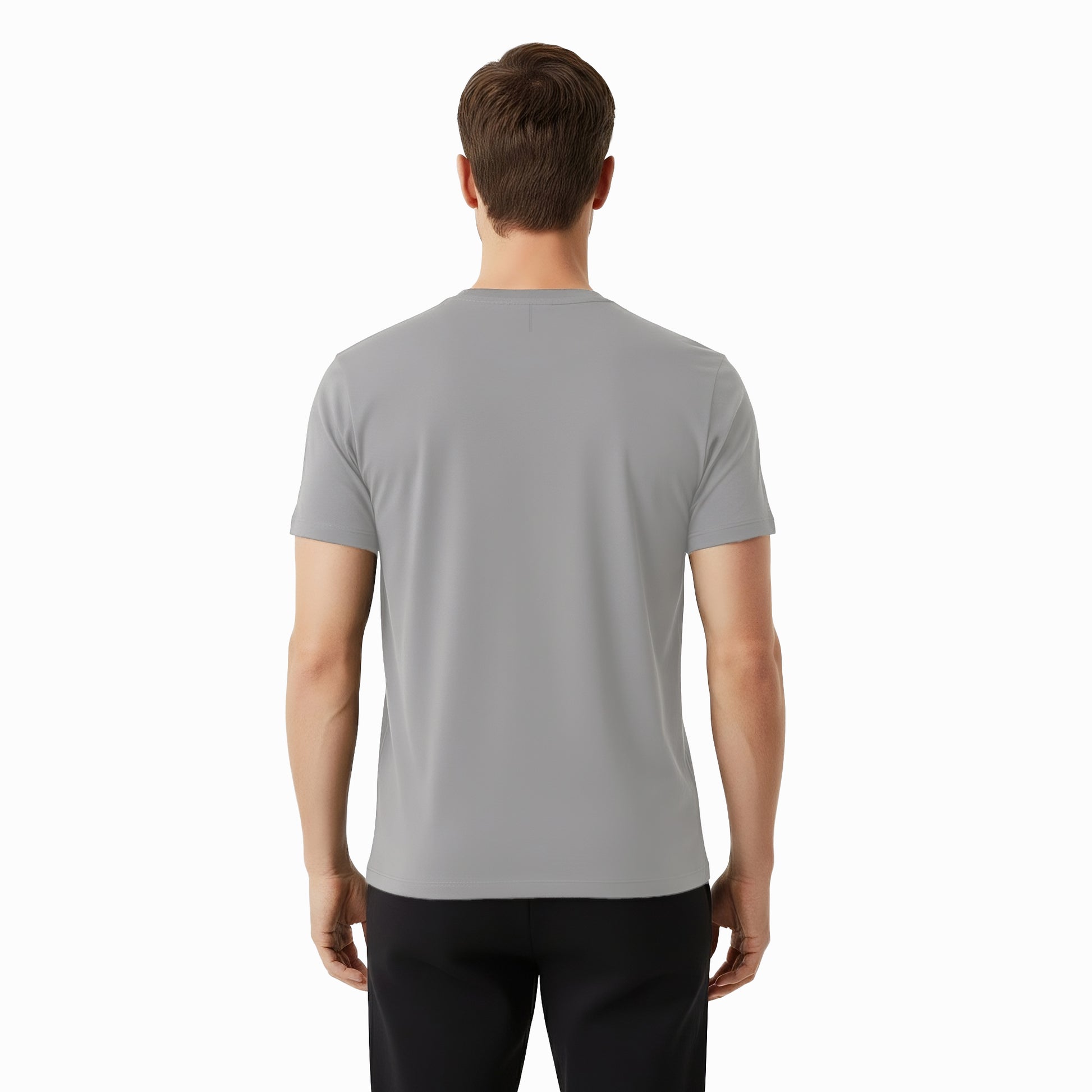 Man wearing a gray t-shirt on a white background
