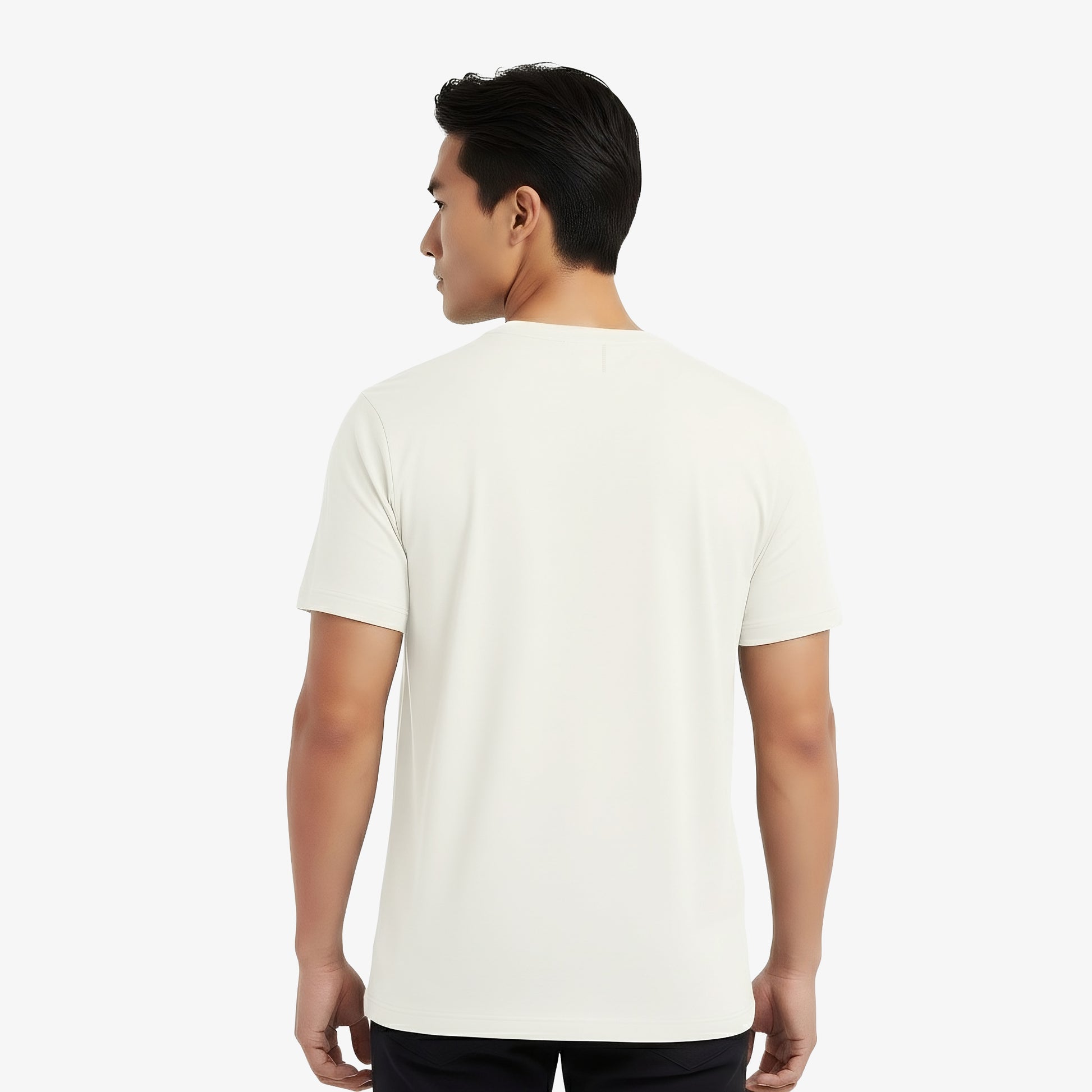Man wearing a plain white t-shirt on a white background