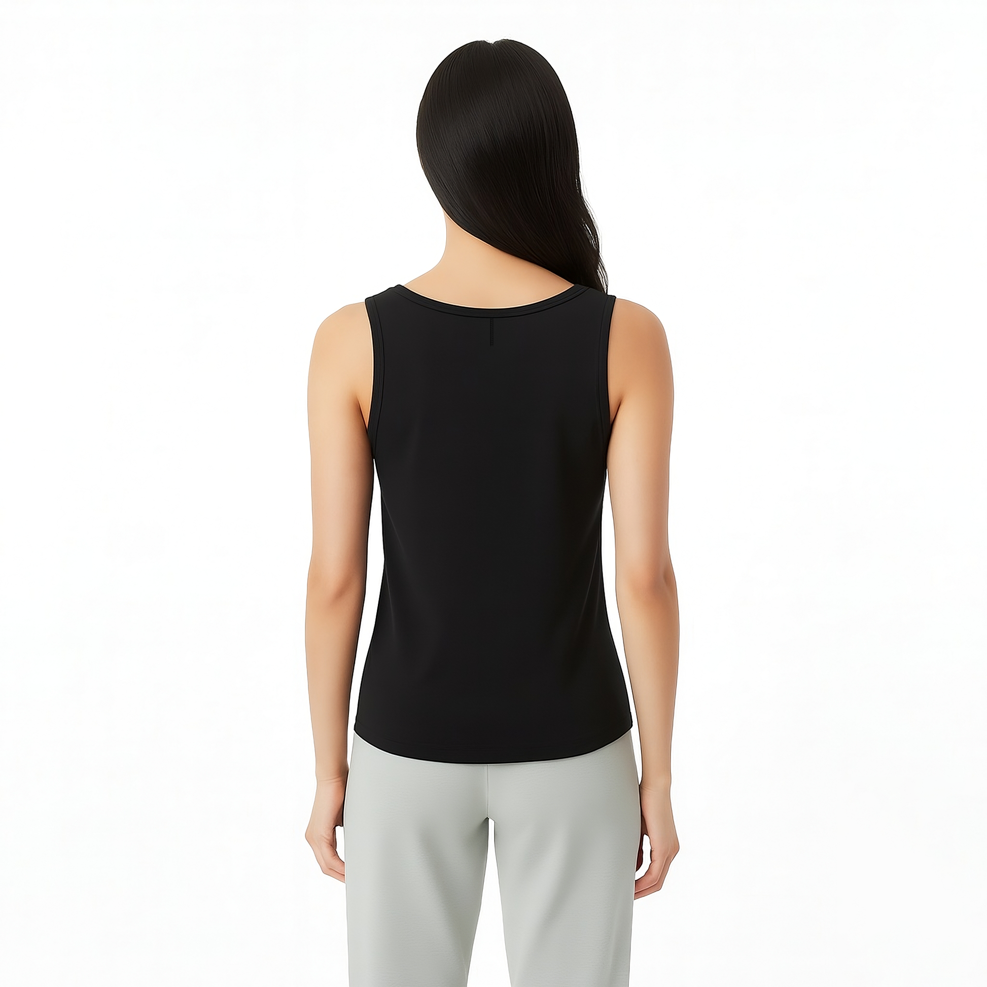 Person wearing a black sleeveless top and light gray pants on a white background