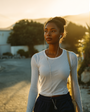 Woman walking outdoors with a blurred background